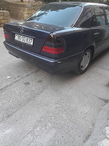 renault megane disk: Mercedes-Benz E-Class (W210) sedan - Kuzov: 4 qapılı sedan, tünd göy — 2