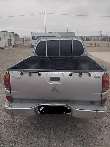 ruçnoy nə deməkdir: Mitsubishi L200 4WD pikap - Gümüş rəng, ikiqat kabin (Double Cab) – 5 — 1