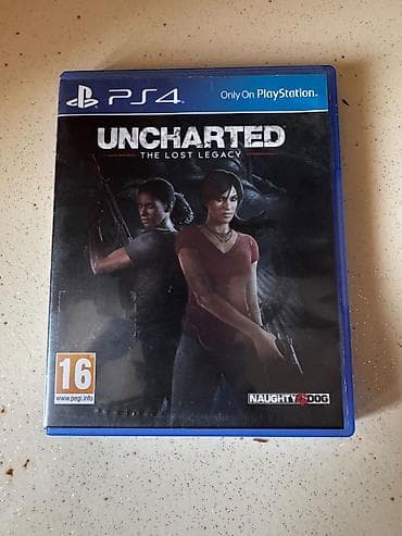 PS4 oyun diskləri – Uncharted: The Lost Legacy və Red Dead Redemption — 1