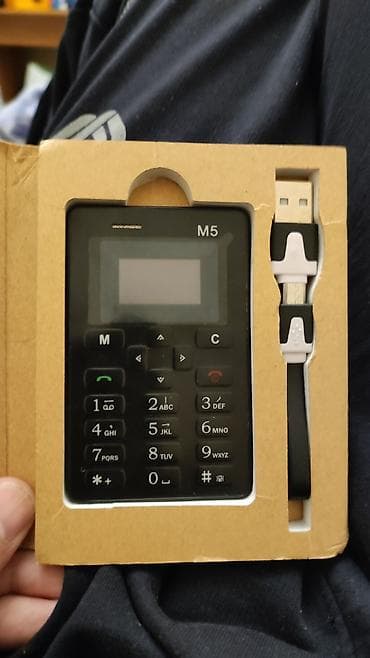 kredit telfonlar: M5 “Card Phone” – ultra-nazik mini telefon Xüsusiyyətlər: - Kart — 1