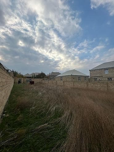 kub az heyet evleri: Tikinti — 1