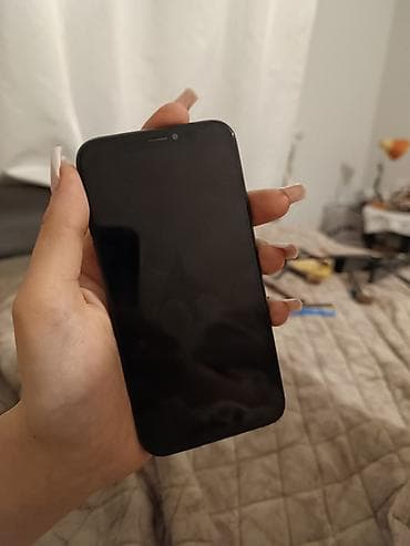 plata iphone: IPhone Xs, 256 GB, Black Titanium — 1