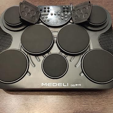 Elektro baraban Medeli DD 315 Musiqilər:100 Səslər:265 Səs yazdırıcı:+ — 1
