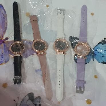 Dairəvi kadranlı və bəzəkli çərçivəli bu qadın kvars saatları