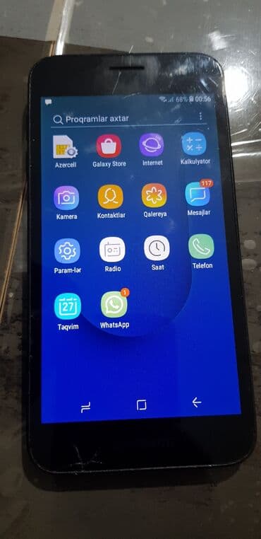 телефон fly fs457 nimbus 15: Samsung Galaxy J2 Core, 2 ГБ, цвет - Золотой, Сенсорный — 1