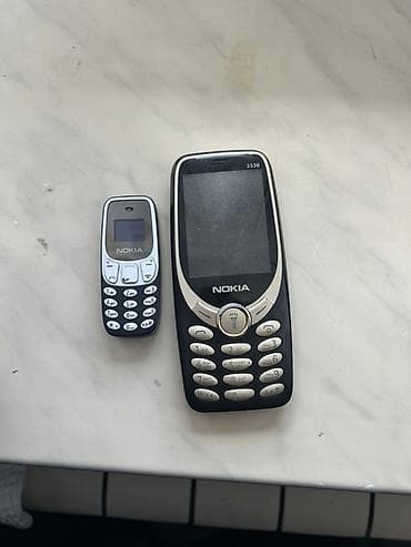 saat telefon: Nokia 3310, < 2 GB Memory Capacity, rəng - Qara, Düyməli — 2