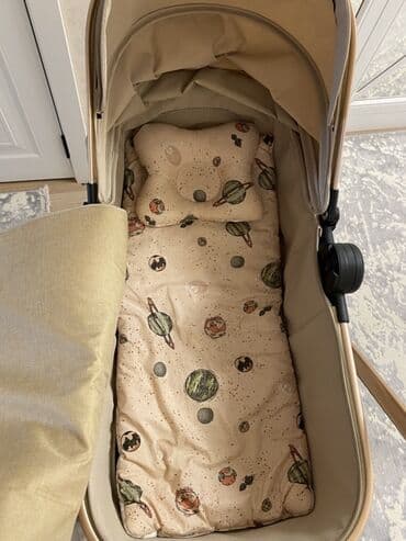 kalyaska ve usaq sumkasi: Çıxarıla bilən beşikli araba, Kidilo — 1