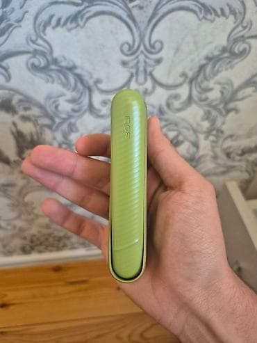 Məhsul: IQOS (yaşıl rəngdə) tütün isidən cihaz dəsti Təsvir: - — 2