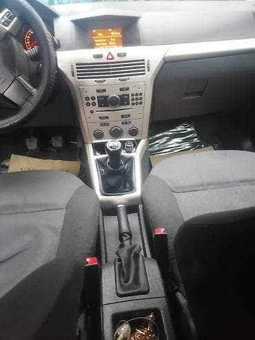 angel fara: Opel Astra H, 5 qapılı hetçbek - Kuzov: Hetçbek, tünd mavi rəng - — 6