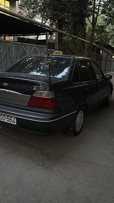 klas 6: Daewoo Nexia sedan – qara rəng, 4 qapı, ön və arxa tərəfdən geniş — 2