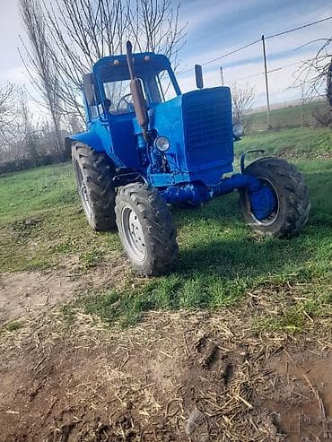 turbo az traktorlar: Mavi rəngdə kabinəli kənd təsərrüfatı traktoru. Xüsusiyyətlər: - — 8