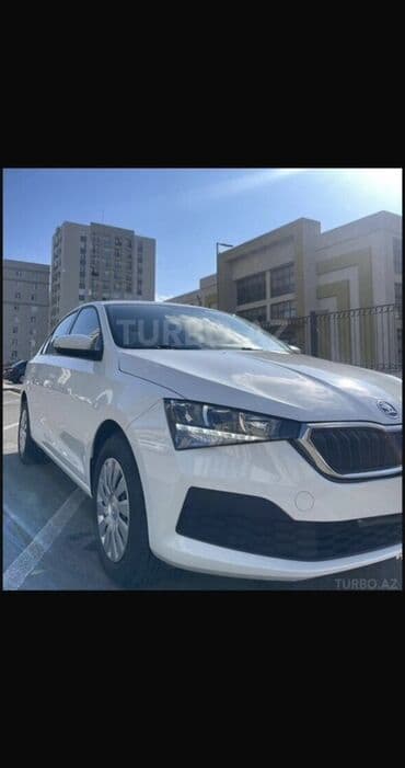 disklər r14: Skoda Rapid – ağ rəngli, şəhər və tras üçün universal sedan. Texniki — 2