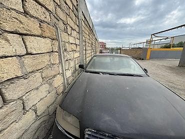 lizing avtomobil: Audi A6 (C5) sedan – qara rəngdə, S-line arxa emblemli. - Kuzov: 4 — 2