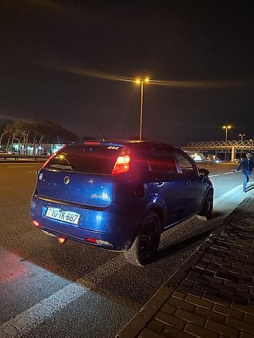 on lip universal: Fiat Grande Punto – mavi rəngli, 5 qapılı hetçbek. kondisaner sukanin — 6