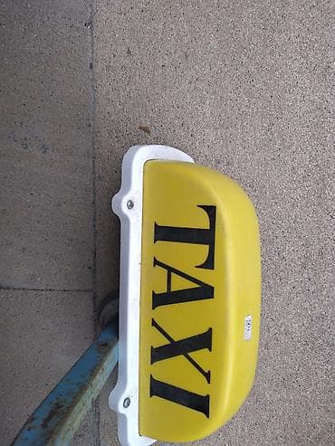 Reklam lövhələri: Taksi dam üstü işıq lövhəsi - Rəng: sarı fon, qara “TAXI” yazısı - — 1