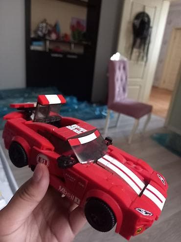 maraqli oyuncaqlar: LEGO tərzində yığılan Porsche yarış avtomobili modeli. Oyuncaq qara və — 6