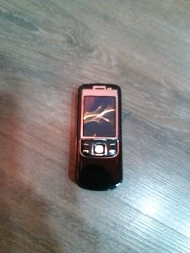 Apple iPhone: Qara rəngli sürüşdürülən düyməli mobil telefon Xüsusiyyətlər: - — 4