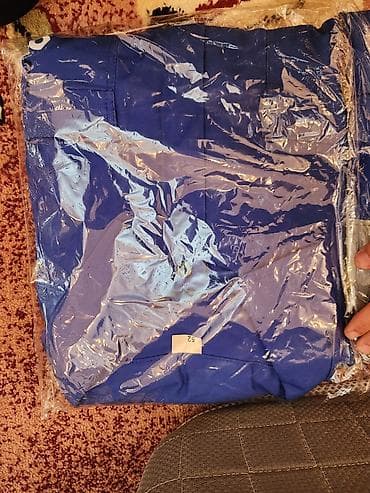 canta modelləri: Mavi rəngli kişi kostyumu – paketlənmiş halda. mavi kamizonlar 35 — 1