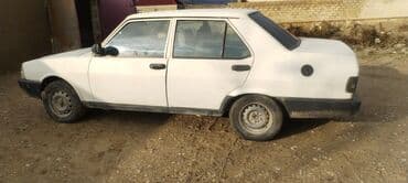 Tofaş doğan sedan - Korpus: ağ rəng, 4 qapı, klassik kvadrat dizayn -