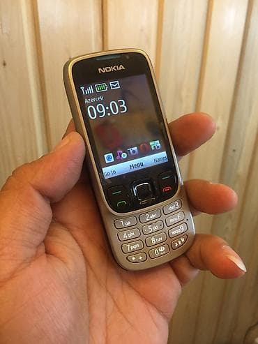 Knopkali telefon aliram