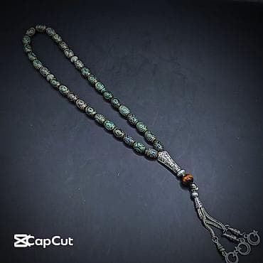 Məhsul: Təsbeh - Material: Tebii Yaşıl-qəhvəyi Əqiq daşı Dzi muncuqlar