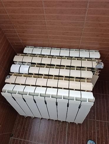 Radiator 41 seksiya 4azn bir seksiya Qaracuxur 1414 leliAlüminium