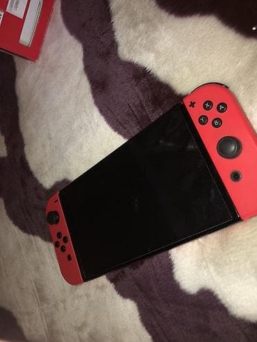 xiaomi tab: Nintendo Switch OLED – Mario Red Edition Xüsusiyyətlər: - 7 düymlük — 2