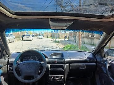 opel astra oluxanasi: Opel Astra F Caravan (universal), mavi rəng Xüsusiyyətlər:.1997 - — 1