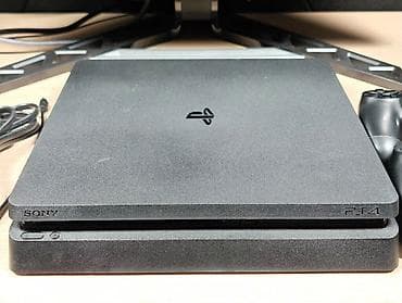 s10 tb: Playstation 4 slim 1 tb yaddasnan. Ev seraitinde istifade olunub.Hec — 2