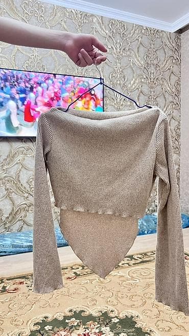 qadin ucun: Qadın üst geyimləri – 4 ədəd Heresi 5 manatdan 1) Şəffaf qara bluz — 3