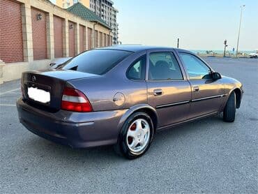 садор диски: Tünd boz rəngdə "Opel Vectra" modeli, sedan tipli avtomobil — 7