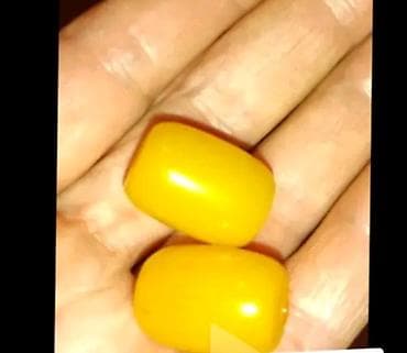 Sarı rəngli, hamar səthli 2 ədəd muncuq/aksesuar daşı. - Forma