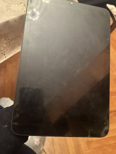 modio planşet: Modio planşet Xüsusiyyətlər: - Qara rəngdə, nazik alüminium gövdə — 1