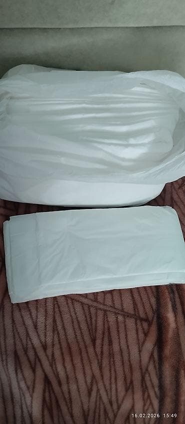 korpu kran: Ağ rəngli korpe altina serilen birdefelik eskiler, bir ededi 1man 20 — 2