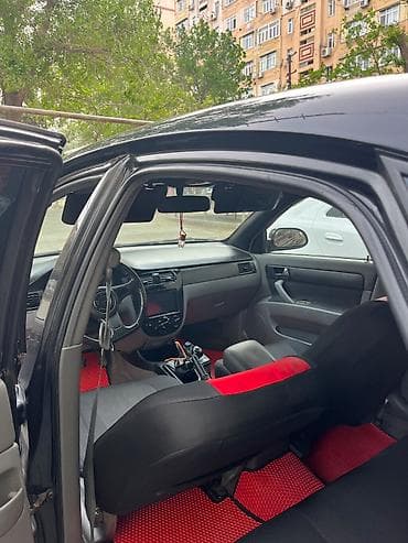 chery a 21: Chevrolet Lacetti: 1.8 l | 2010 il 300000 km Sedan — 7