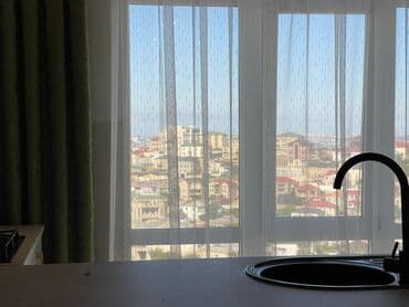 xocasəndə evlər: Badamdarda 2-ci massivdə 18 mertebeli binanın 16-ci mərtəbəsində — 4