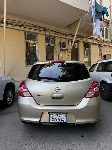carolla disk: Nissan Tiida: 1.5 l | 2011 il Hetçbek — 2