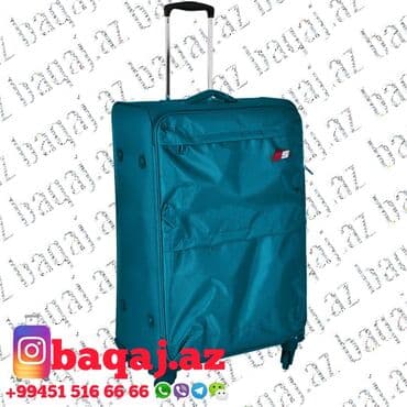 boyuk hovuz: Очень большой чемодан со съёмными колесами.Cox boyuk camadan.Tekerleri — 2