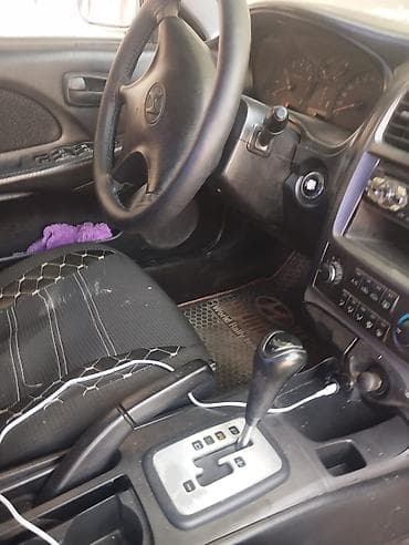 chevrolet volt salon: Hyundai Sonata sedan – gümüşü rəngdə, avtomatik transmissiya — 2