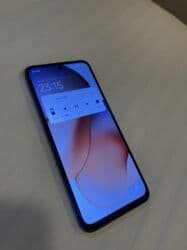 xiaomimi 10256 gb: Xiaomi 12, 128 GB, rəng - Qara, 
 Düyməli, Barmaq izi, İki sim kartlı — 5