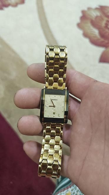 Smart saatlar: RADO kişi qol saatı - Korpus: düzbucaqlı forma, qara çərçivəli qızılı — 1