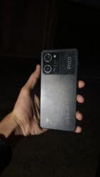 телефон fly nimbus 1: Poco X5 Pro 5G, 256 GB, rəng - Qara, Sensor — 1