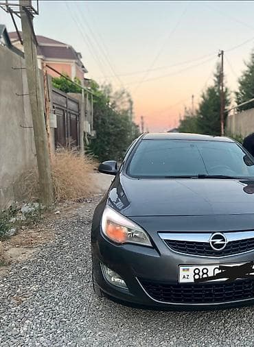 Opel Astra: 1.4 l | 2010 il Hetçbek