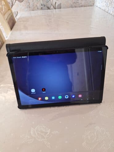 андроид мониторы для prado: Funksional qara rəngli Samsung planşet. Onun geniş, yansımayan ekranı — 5