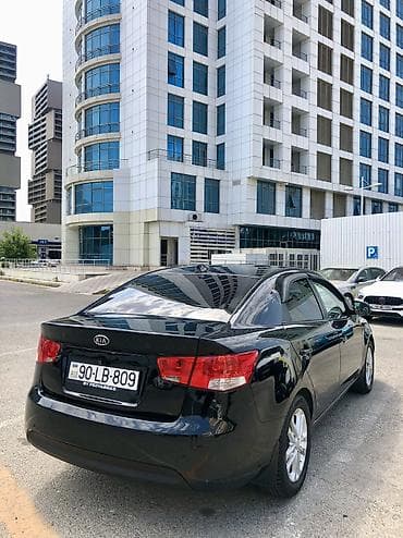 disk qabi: Kia Cerato: 1.6 l | 2011 il Sedan — 3
