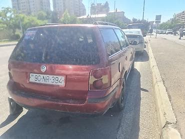 passat 2004: Volkswagen Passat Variant (Universal) – qırmızı rəng, arxa ötürücülü — 1