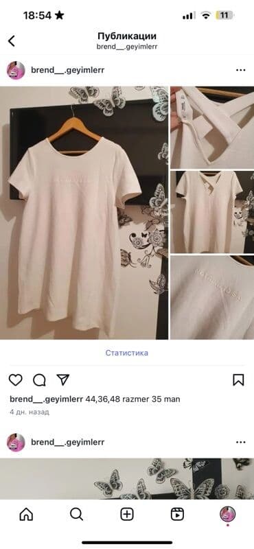 Ağ rəngdə, qısaqol, düz biçimli t-shirt. Üzərində "NOTHING TO SAY"