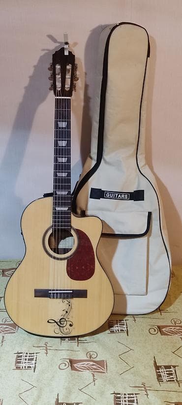 Гитары: Elektro-akustik klassik gitara + çantası - Korpus: kəsimli (cutaway) — 1