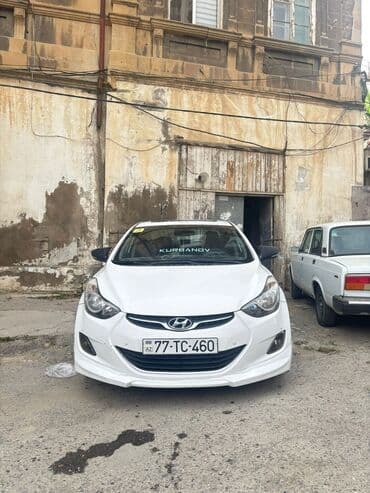 aston martin vanquish 5.9 at: Hyundai Elantra: 1.8 l | 2011 il Sedan — 2