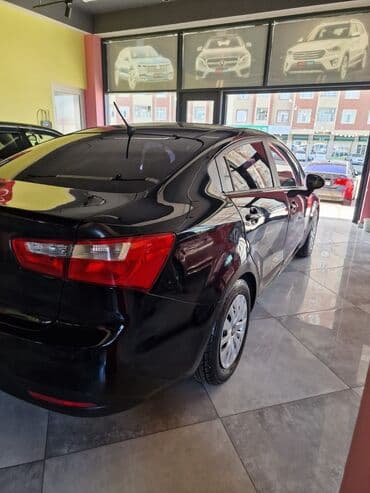 təkər satşı: Kia Rio sedan – qara rəng Kuzov: 4 qapılı sedan Mühərrik: benzin — 5